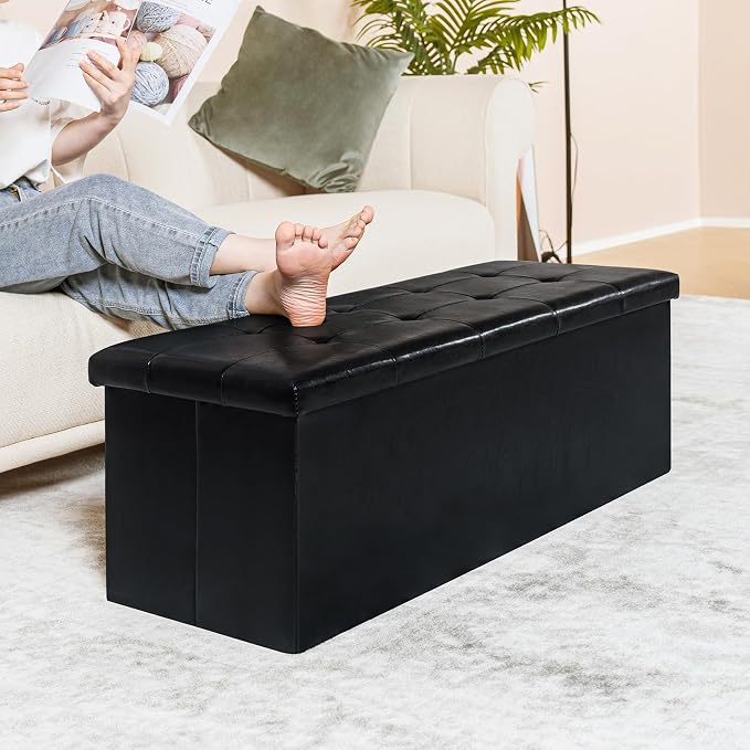 PINPLUS Folding Storage Ottoman Bench, Black Faux Leather | Storage Chest with Padded Seat, Blanket Organizer, Footrest Stool for Bedroom, Living Room and Office, 43.3 Inch