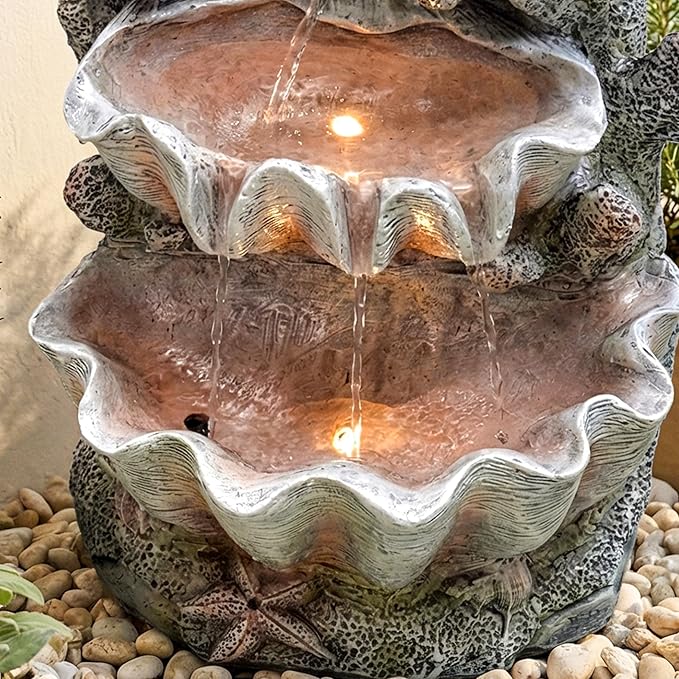 19-Inch Outdoor Water Fountain, 3-Tier Indoor & Outdoor Coral & Seashell Resin Waterfall Fountain with 2 LED Lights, Ocean Themed Water Feature for Garden, Patio, Yard, Balcony, Deck in Pink